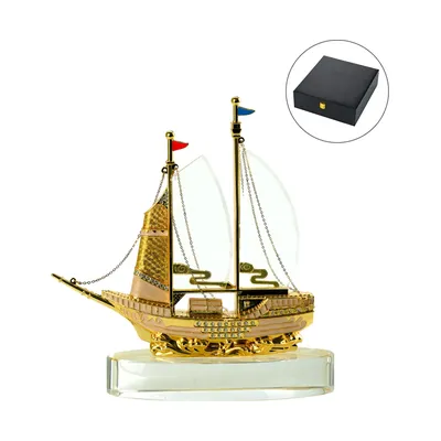 Golden Boat Shaped Memento in Metal with Glass Base in Luxury Box